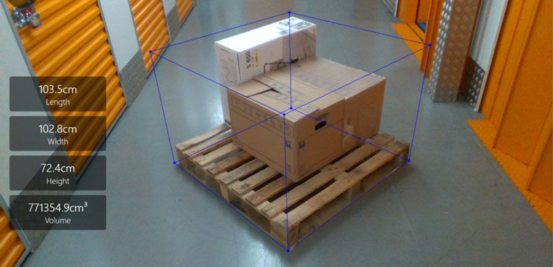 Object detection calculates dimensions for optimal placement of boxes stacked on a pallet.